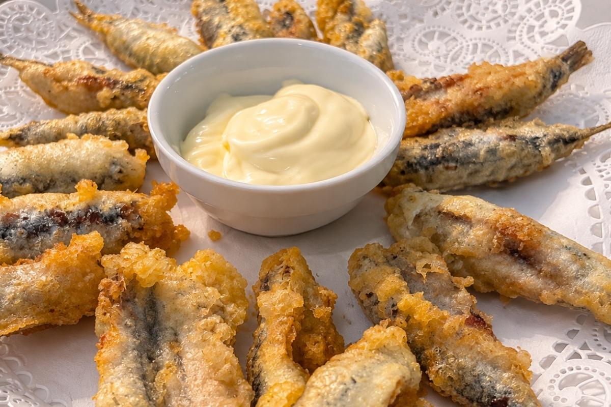 Los boquerones en tempura son una tapa tipica de Carmona ideal si te preguntas donde comer
